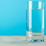 A Tall Glass with Water Meaning, Usage & Examples